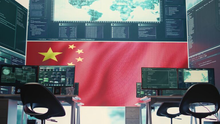 Empty cyber security room presenting a Chinese flag on big screen